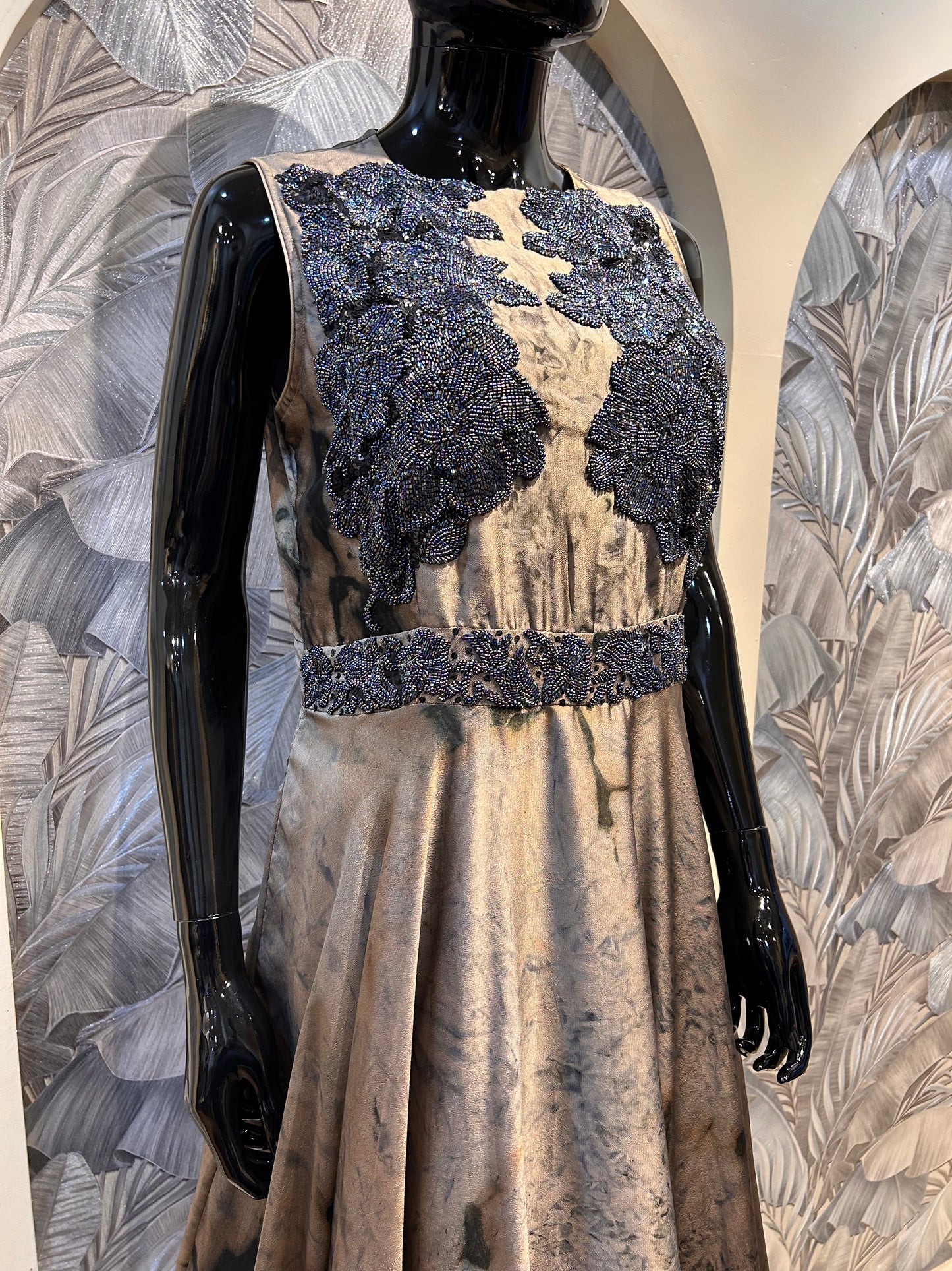 Old burgundy georgette gown with hand-beaded floral appliqué on bodice and marbled dye effect on flowing skirt