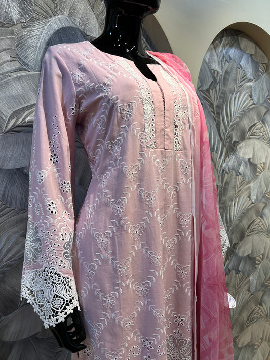 Muted tuscany pink cotton suit with white thread embroidery and eyelet cutwork accents, paired with dupatta