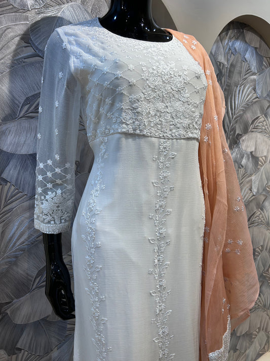White chiffon suit with delicate floral embroidery and peach embroidered dupatta